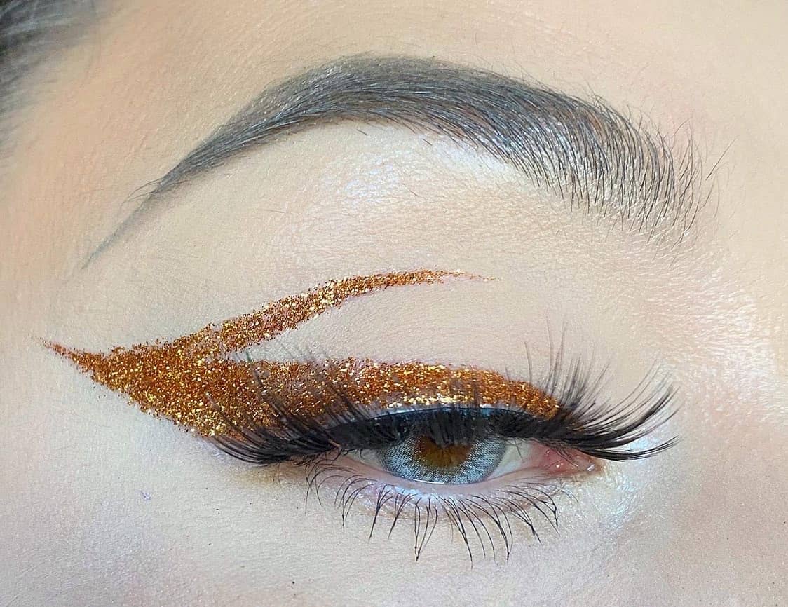 Orange glitter on sale eye makeup